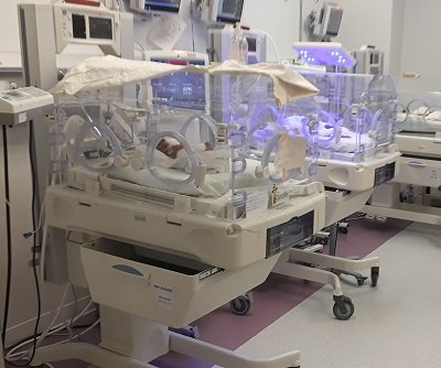 Some babies are placed under artificial lights