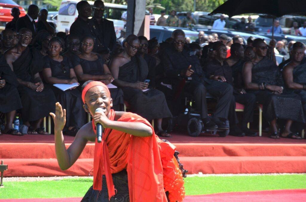 Denida Owusu Appiah reciting a poem about Theresah Kufuor