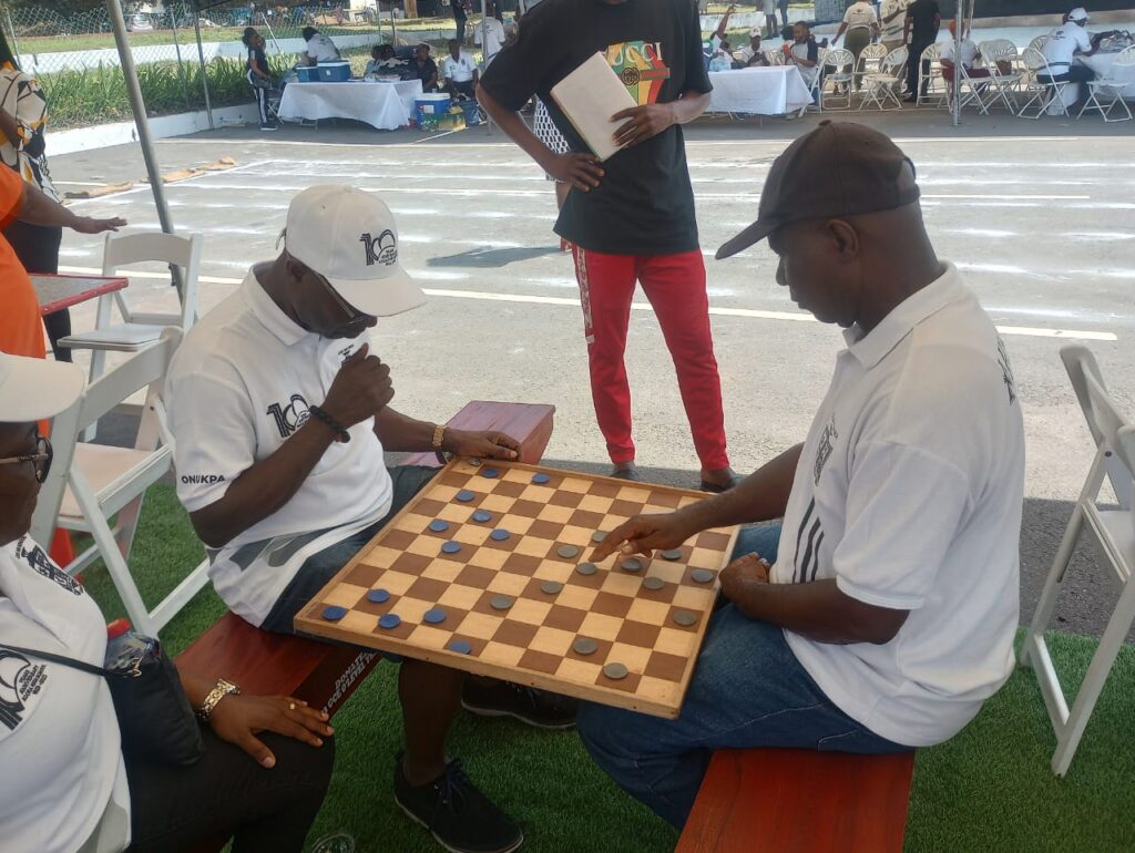 Some Onukpai  playing draughts