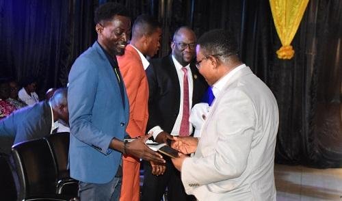 • Mr Noah Gyemah[right] interacting with Prof Amevi Acakpovi Mr Kwesi Agyei Sarfo[second from left]and Mr jeffery Yeboah Frimpong. Photo Lizzy Okai