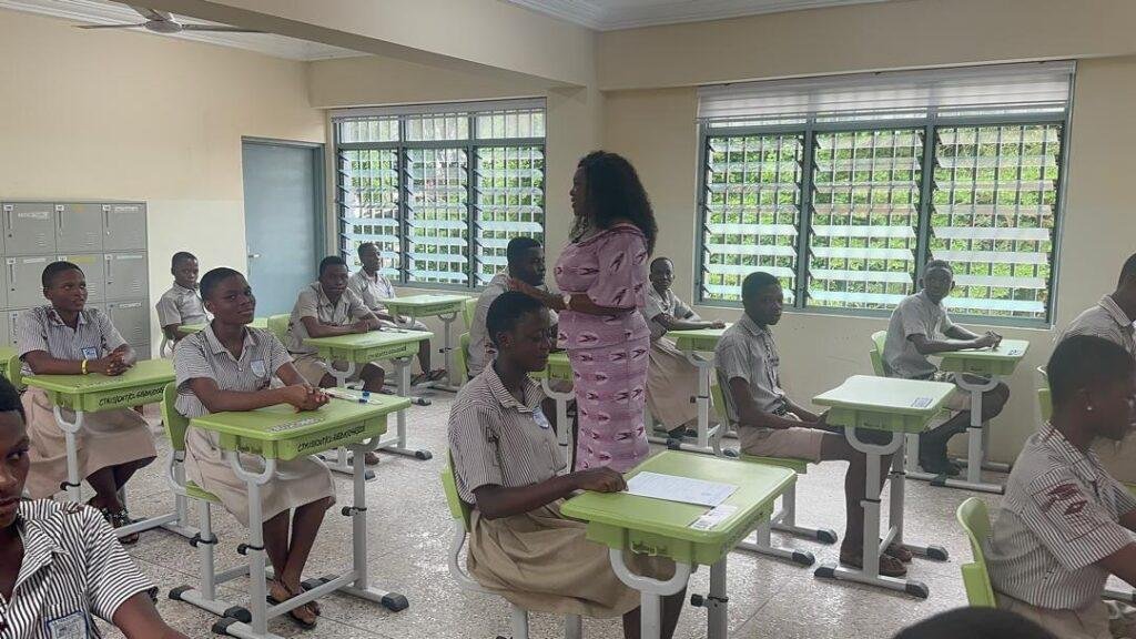 Ms Rita Naa Odoley Sowah advising the BECE candidates writing the exam at the Christ the King Centre at La in Accra. Photo. Victor A. Buxton