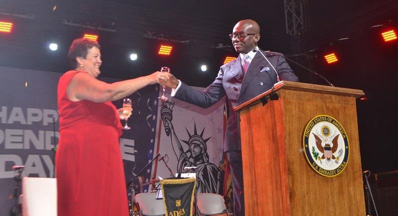 Ms Virgenia Palmer (left) and Mr Godfred Odame proposing a toast during the programme Photo Victor A. Buxton