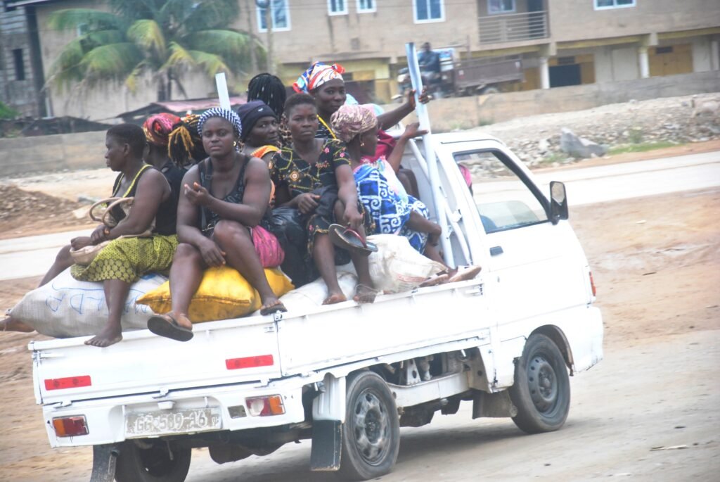 Our mothers seating on top of their foodstuffs in a moving vehicle on the Nsawam Road Photo Elizaabeth Okai