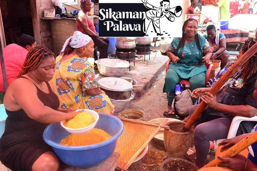 • Some Ga women preparing the delicious festive dish known as kpokpoi