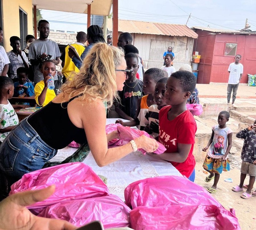 • A section of the children receiving their books