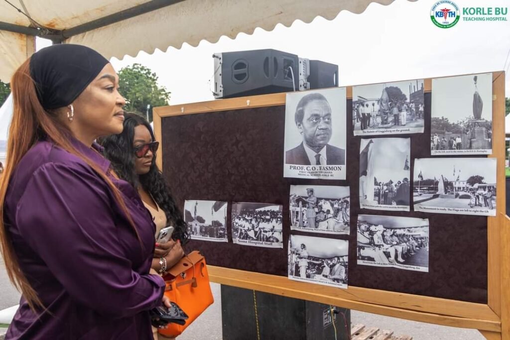 Kalsum Sinare and Jackie Appiah  viewing the  photo exhibition