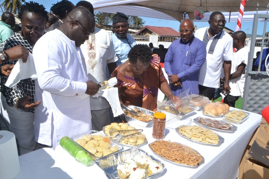 • Mr Nikoi (left) and other dignitaries inspecting some of the products from the graduands Photo Victor A. Buxton