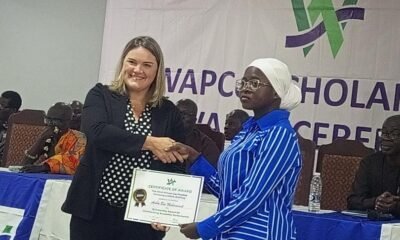 Mrs Burkett (left) presenting an award certificate to Muhammed Bin Aisha, a BSc Petroleum Refining and Petrochemical Engineering student at University of Mines and Technology (UMaT),Tarkwa.