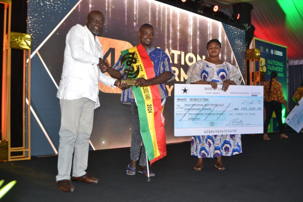 Mr. Stephen Addo,pose for the camera after receiving the National Best Physically Chanllenged Farmer Award   Photo Victor A. Buxton