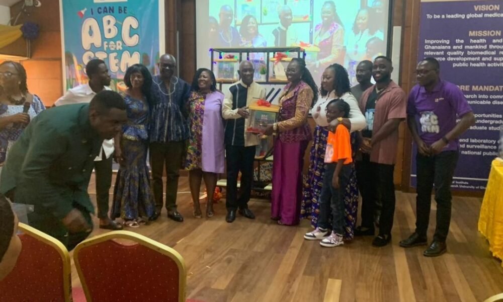 • Miss Eugenia Agyeiwaa Boadi, Founder of KIDSATHOME Educatioonal Centre in a group photograph with her family