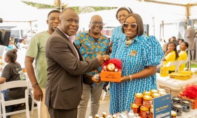 • Ms Rosemary Beryl Archer (right) presenting a made in-Ghana product to Mr Yaw Frimpong Addo