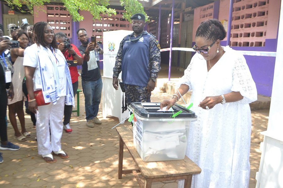 A section of media personnel observes as Ms Lordina Mahama cast her vote while Ms Rita Odoley Sowah Photo Victor A. Buxton