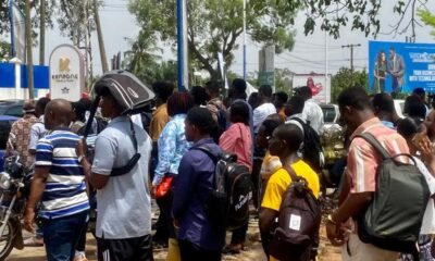 Some young men queing for visas