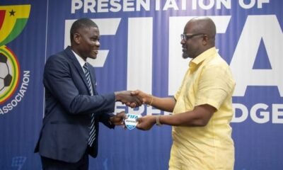 Ref Serlom Yao Bless (left) receiving his badge from FA President, Kurt Okraku