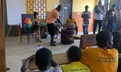 Some of the children observing the Dilemma of A Ghost closely works with plastic material