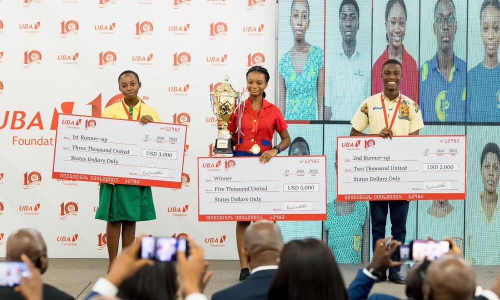 • Top three winners displaying their awards