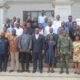 • Dr Omane Boamah (middle) with members of the press corps and staff of the ministry