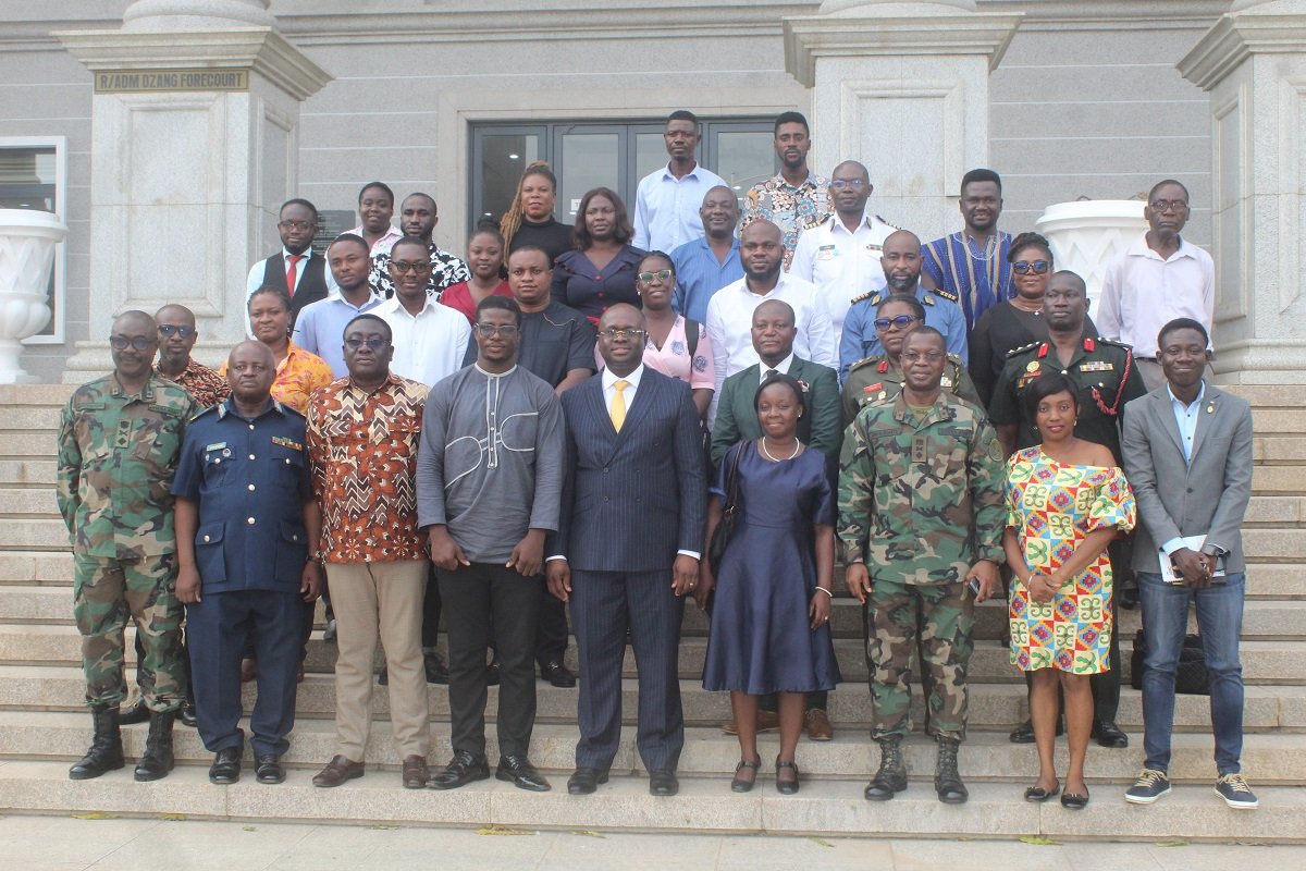 • Dr Omane Boamah (middle) with members of the press corps and staff of the ministry