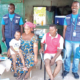 • A group picture of the team and the family after successful vaccination