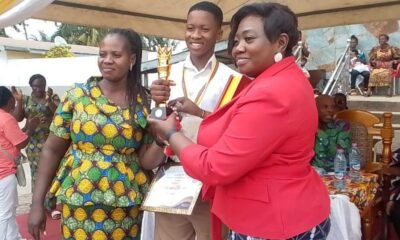 • Dr Mrs Appiah-Pinrah presenting awards to a student.