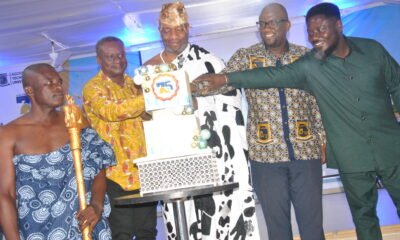 • The Ga Mantse Tackie Teiko Tsuru II [Middle] cutting the Anniversary Cake being assisted by Dr Samuel Bassah Quansah [right] Prof Amevi Acakpovi [2nd from right] and others Photo Lizzy Okai.