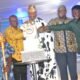 • The Ga Mantse Tackie Teiko Tsuru II [Middle] cutting the Anniversary Cake being assisted by Dr Samuel Bassah Quansah [right] Prof Amevi Acakpovi [2nd from right] and others Photo Lizzy Okai.