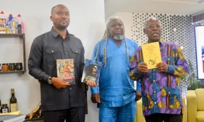 • Ambrose Nsarkoh, Deputy CEO Ghana Export Promotion Authority, Nana Achampong (middle) Prof Kojo Yankah launching the books