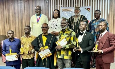 Dr Nyaho-Tamakloe (second fron right, behind) with other award winners after the event