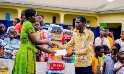 Mr Ansong (right) presenting the items to Madam Ahama (left)